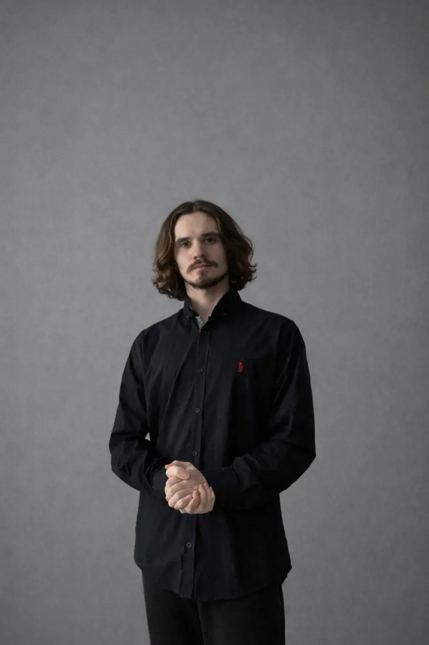 Alexander K.
